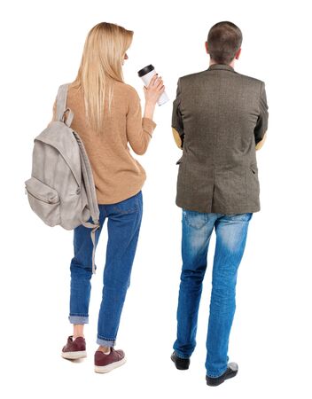 Back view of couple in sweater. beautiful friendly girl and guy together. Rear view people collection. backside view of person. Isolated over white background.の写真素材