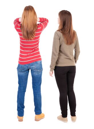 Back view of two woman in sweater. beautiful friendly girl and guy together. Rear view people collection. backside view of person. Isolated over white background.の写真素材