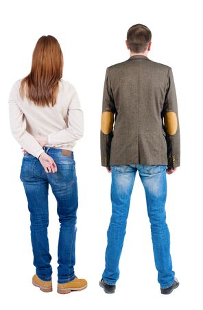 Back view of couple in sweater. beautiful friendly girl and guy together. Rear view people collection. backside view of person. Isolated over white background.の写真素材