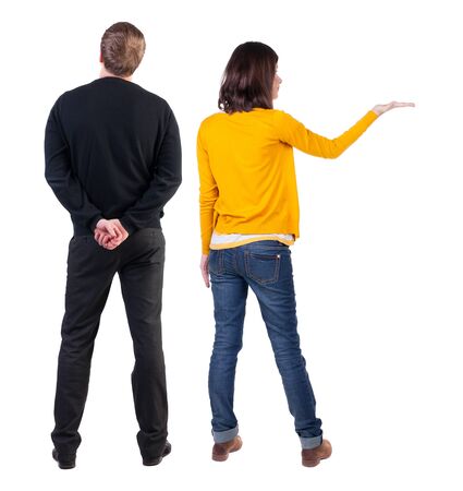 Back view of couple in sweater. beautiful friendly girl and guy together. Rear view people collection. backside view of person. Isolated over white background.の写真素材
