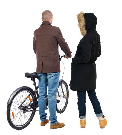 Back view of couple in winter jacket. man on a bicycle and a woman. Rear view people collection. backside view of person. Isolated over white background.の写真素材