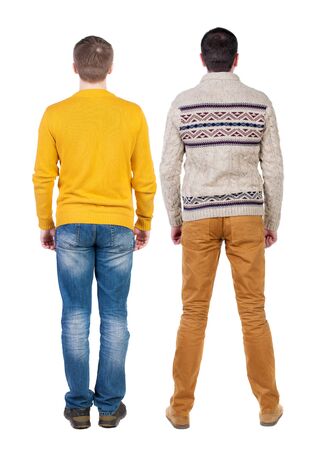 Back view two man in sweater. Rear view people collection. backside view of person. Isolated over white background. Guys looking forwardの写真素材