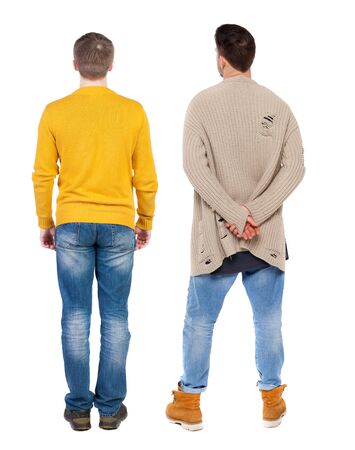 Back view two man in sweater. Rear view people collection. backside view of person. Isolated over white background. Guys looking forwardの写真素材