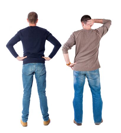 Back view two man in sweater. Rear view people collection. backside view of person. Isolated over white background. Guys looking forwardの写真素材