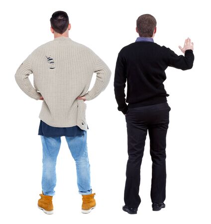 Back view two man in sweater. Rear view people collection. backside view of person. Isolated over white background. Guys looking forwardの写真素材