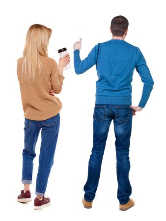 Back view of couple in sweater showing thumbs up. beautiful woman and man together. Rear view people collection. backside view of person. Isolated over white background.の写真素材