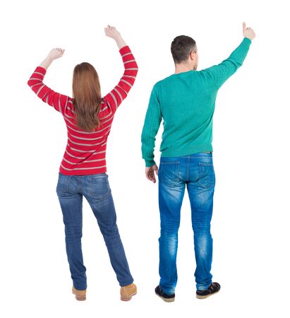 Back view of couple in sweater showing thumbs up. beautiful woman and man together. Rear view people collection. backside view of person. Isolated over white background.の写真素材