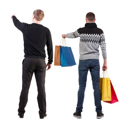 back view of two man with shopping bags. backside view of person. Rear view people collection. Isolated over white background. Two man in a store.の写真素材