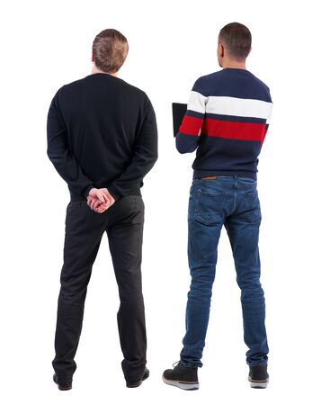 Back view two man in sweater. Rear view people collection. backside view of person. Isolated over white background. Guys looking forwardの写真素材
