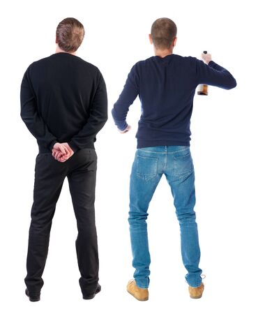 Back view two man in sweater. Rear view people collection. backside view of person. Isolated over white background. Guys looking forwardの写真素材