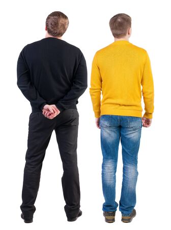 Back view two man in sweater. Rear view people collection. backside view of person. Isolated over white background. Guys looking forwardの写真素材