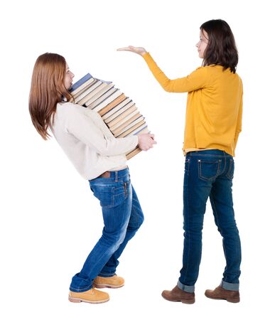 Back view of two woman in sweater. Rear view people collection. backside view of person. Isolated over white background. Girls are looking forwardの写真素材