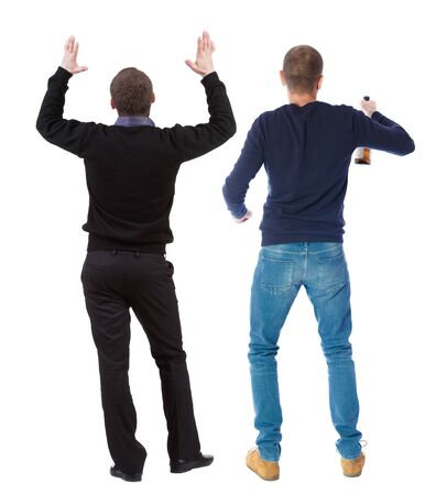 Back view two man in sweater. Rear view people collection. backside view of person. Isolated over white background. Guys looking forwardの写真素材