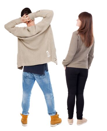 Back view couple in sweater. beautiful man and woman. Rear view people collection. backside view of person. Isolated over white background.の写真素材