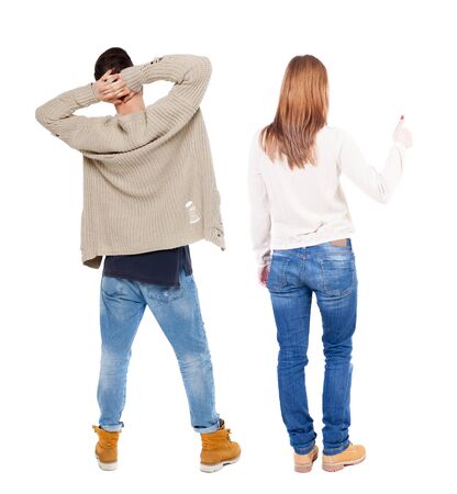 Back view of couple in sweater showing thumbs up. beautiful woman and man together. Rear view people collection. backside view of person. Isolated over white background.の写真素材