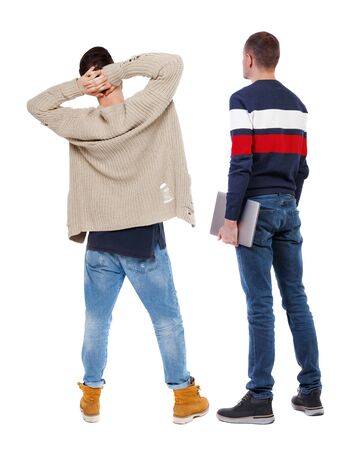Back view two man in sweater with laptop. Rear view people collection. backside view of person. Isolated over white background. Guys looking forwardの写真素材