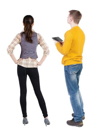 Back view of couple in sweater with mobile phone. beautiful friendly girl and guy together. Rear view people collection. backside view of person. Isolated over white background.の写真素材