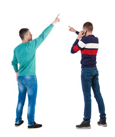 Back view of two man in sweater with mobile phone. Rear view people collection. backside view of person. Isolated over white background.の写真素材