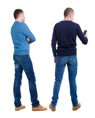 back view of two man with shopping bags. backside view of person. Rear view people collection. Isolated over white background.の写真素材