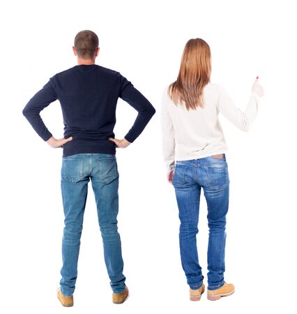 Back view of couple in sweater showing thumbs up. beautiful woman and man together. Rear view people collection. backside view of person. Isolated over white background.の写真素材