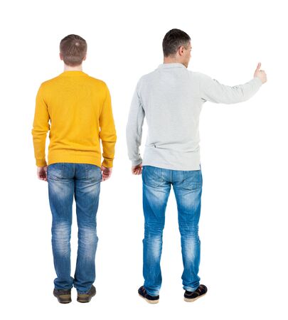 Back view two man in sweater showing thumb up. Rear view people collection. backside view of person. Isolated over white background.の写真素材