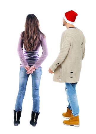 Back view couple in sweater. beautiful man and woman. Rear view people collection. backside view of person. Isolated over white background.の写真素材
