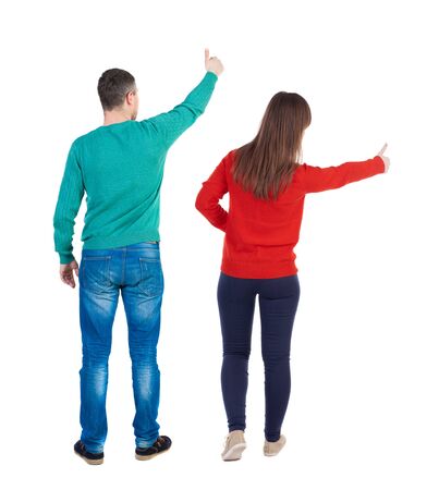 Back view of couple in sweater showing thumbs up. beautiful woman and man together. Rear view people collection. backside view of person. Isolated over white background.の写真素材
