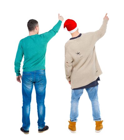 Back view two man in sweater showing thumb up. Rear view people collection. backside view of person. Isolated over white background.の写真素材