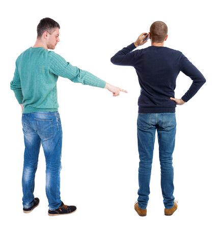 Back view of two man in sweater with mobile phone. Rear view people collection. backside view of person. Isolated over white background.の写真素材