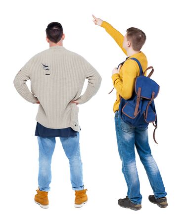 Back view of two man in sweater pointing. Rear view people collection. backside view of person. Isolated over white background. Guys stare aheadの写真素材