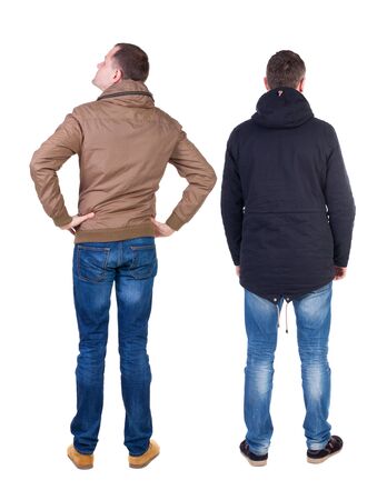 Back view of couple in winter jacket. beautiful friendly girl and guy together. Rear view people collection. backside view of person. Isolated over white background.の写真素材