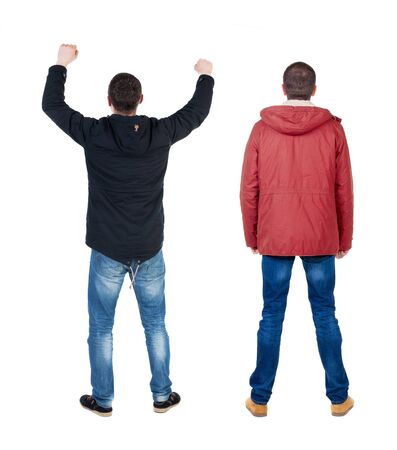 Back view of couple in winter jacket. beautiful friendly girl and guy together. Rear view people collection. backside view of person. Isolated over white background.の写真素材