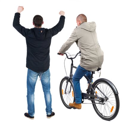 Back view of two man on a bicycle in winter jacket. Rear view people collection. backside view of person. Isolated over white background.の写真素材