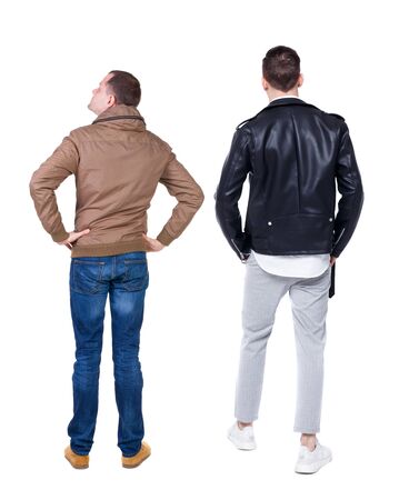 Back view of couple in winter jacket. beautiful friendly girl and guy together. Rear view people collection. backside view of person. Isolated over white background.の写真素材