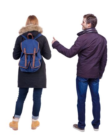 Back view of couple in sweater showing thumbs up. beautiful woman and man together. Rear view people collection. backside view of person. Isolated over white background.の写真素材
