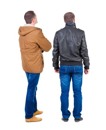 Back view of couple in winter jacket. beautiful friendly girl and guy together. Rear view people collection. backside view of person. Isolated over white background.の写真素材