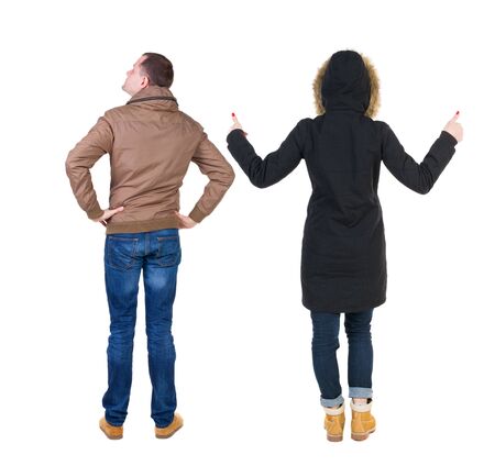 Back view of couple in sweater showing thumbs up. beautiful woman and man together. Rear view people collection. backside view of person. Isolated over white background.の写真素材