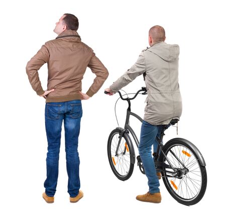 Back view of two man on a bicycle in winter jacket. Rear view people collection. backside view of person. Isolated over white background.の写真素材