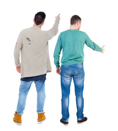 Back view of two man in sweater pointing. Rear view people collection. backside view of person. Isolated over white background.の写真素材