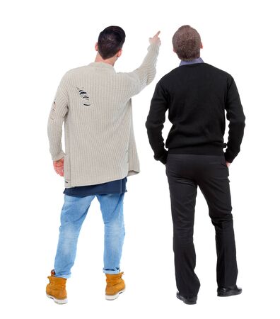 Back view of two man in sweater pointing. Rear view people collection. backside view of person. Isolated over white background.の写真素材