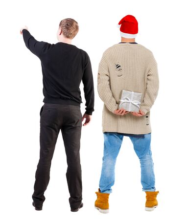 Back view of two man in sweater pointing. Rear view people collection. backside view of person. Isolated over white background.の写真素材
