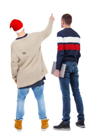 Back view two man in sweater with laptop. Rear view people collection. backside view of person. Isolated over white background. の写真素材