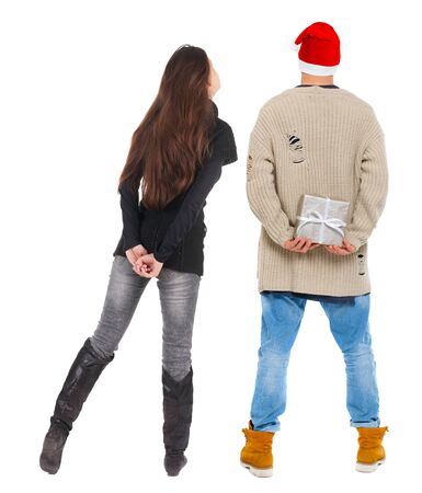 Back view couple in sweater. beautiful man and woman. Rear view people collection. backside view of person. Isolated over white background.の写真素材