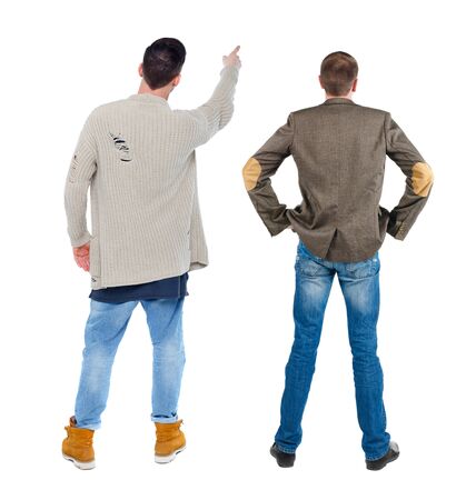 Back view of two man in sweater pointing. Rear view people collection. backside view of person. Isolated over white background.の写真素材