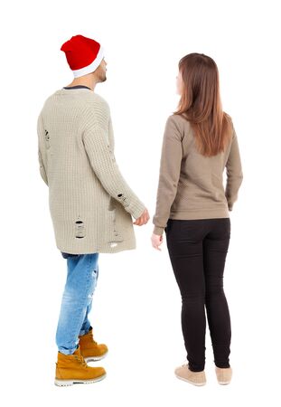 Back view couple in sweater. beautiful man and woman. Rear view people collection. backside view of person. Isolated over white background.の写真素材