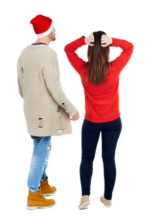Back view couple in sweater. beautiful man and woman. Rear view people collection. backside view of person. Isolated over white background.の写真素材