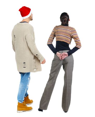 Back view couple in sweater. beautiful man and woman. Rear view people collection. backside view of person. Isolated over white background.の写真素材