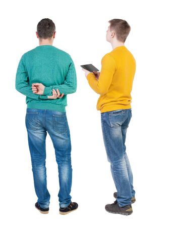 Back view of two man in sweater with mobile phone. Rear view people collection. backside view of person. Isolated over white background.の写真素材