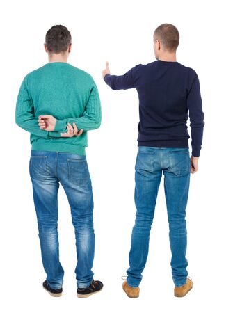 Back view two man in sweater showing thumb up. Rear view people collection. backside view of person. Isolated over white background.の写真素材