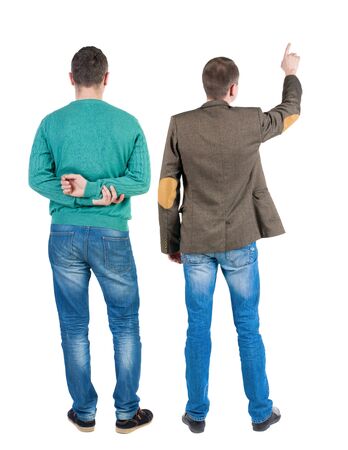 Back view of two man in sweater pointing. Rear view people collection. backside view of person. Isolated over white background.の写真素材